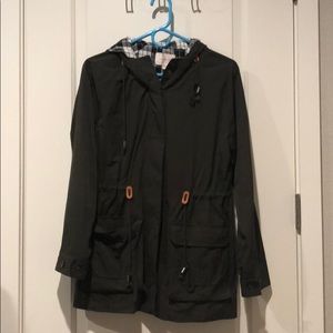 Hooded jacket with cinch waist.